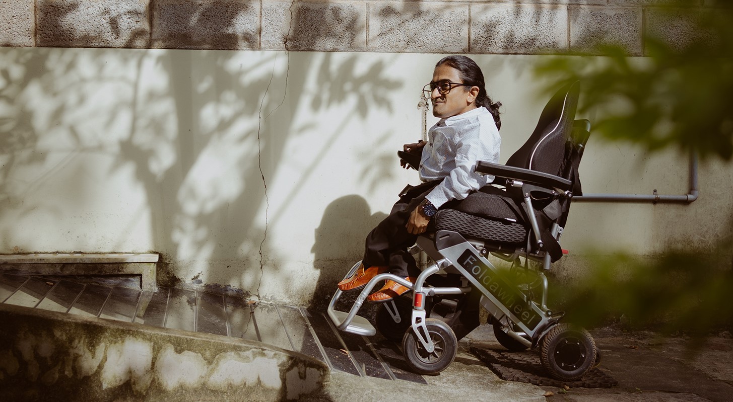 man sitting in wheelchair