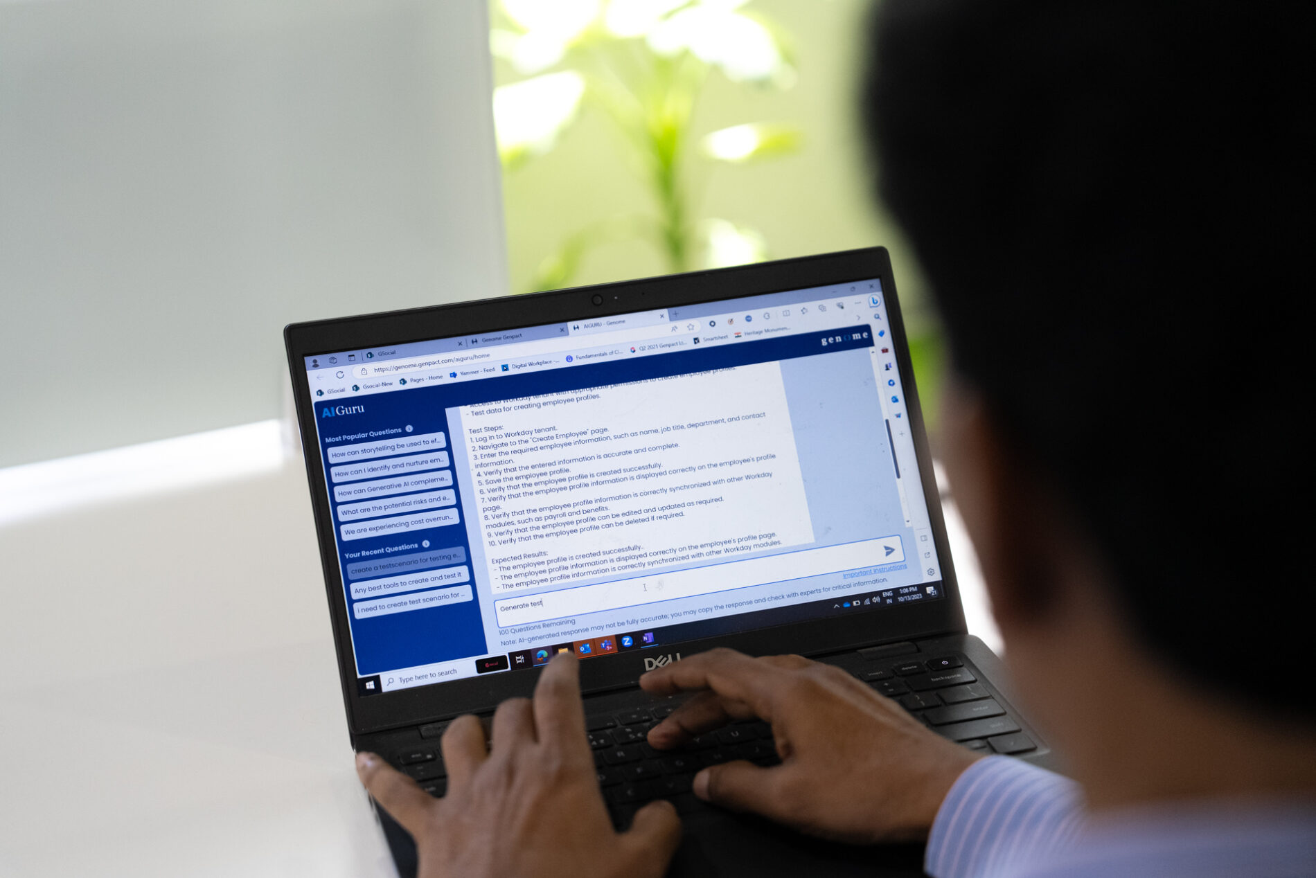 Photo of a person typing on a computer