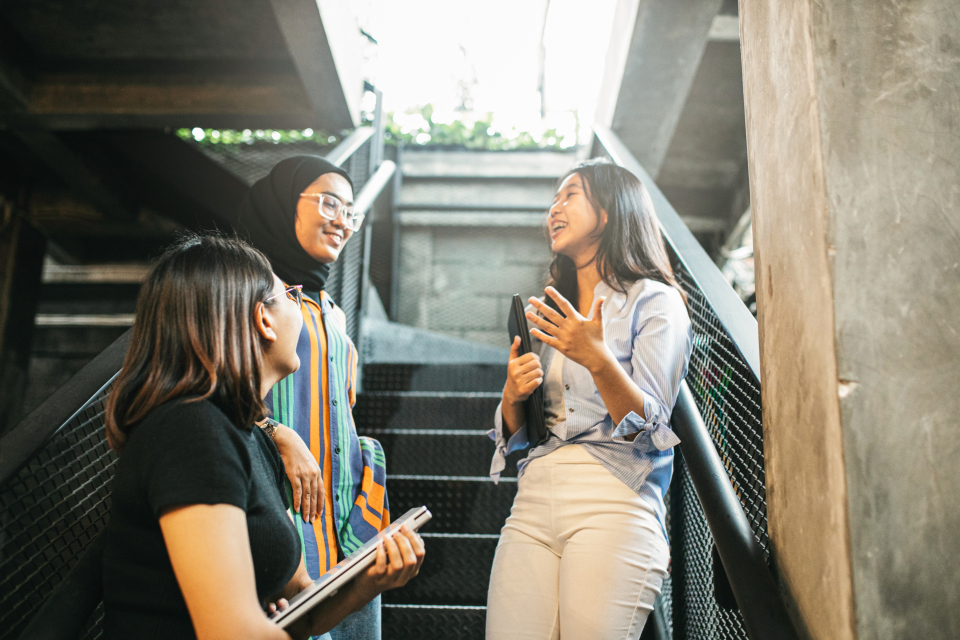 university students having discussion on staircase