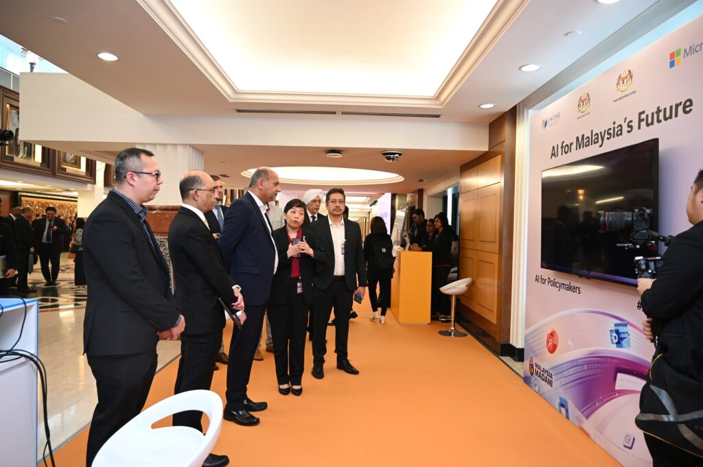 Image of an executive giving a presentation to a group